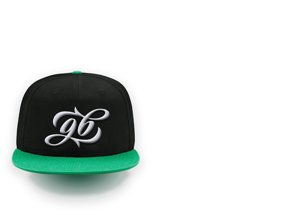 black baseball cap with a flat green rim